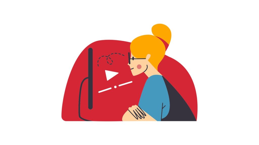 A imagem traz a ilustração de uma mulher assistindo vídeos em frente ao computador. 